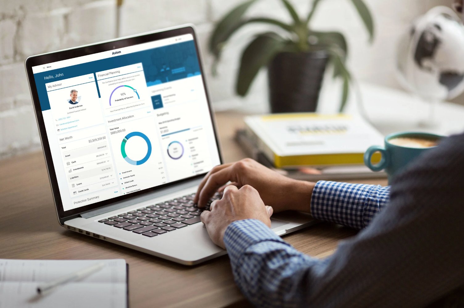 Axiom client dashboard — laptop lifestyle mockup
